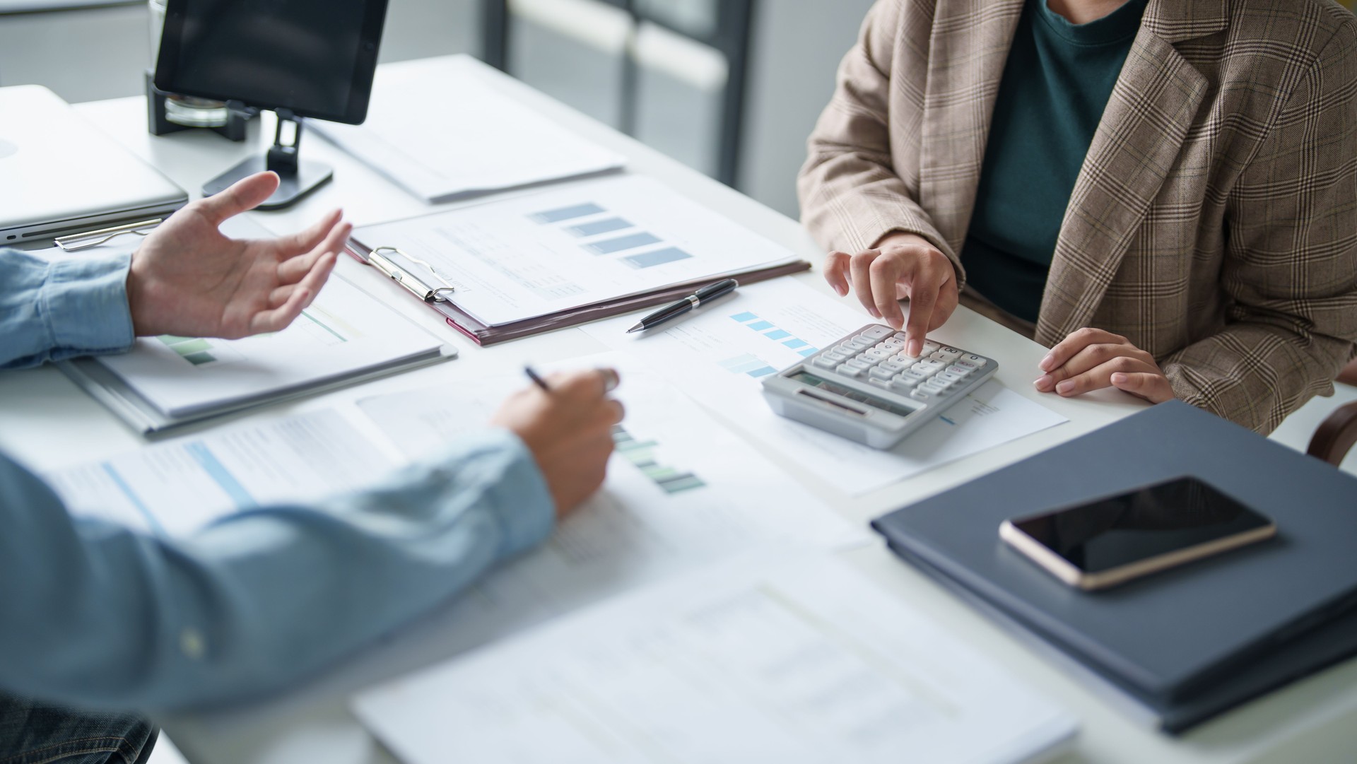 business man Auditor or internal revenue service staff checking annual financial statements company Audit  Accounting tax. business man Auditor or internal revenue service staff checking annual financial statements company Audit  Accounting tax.